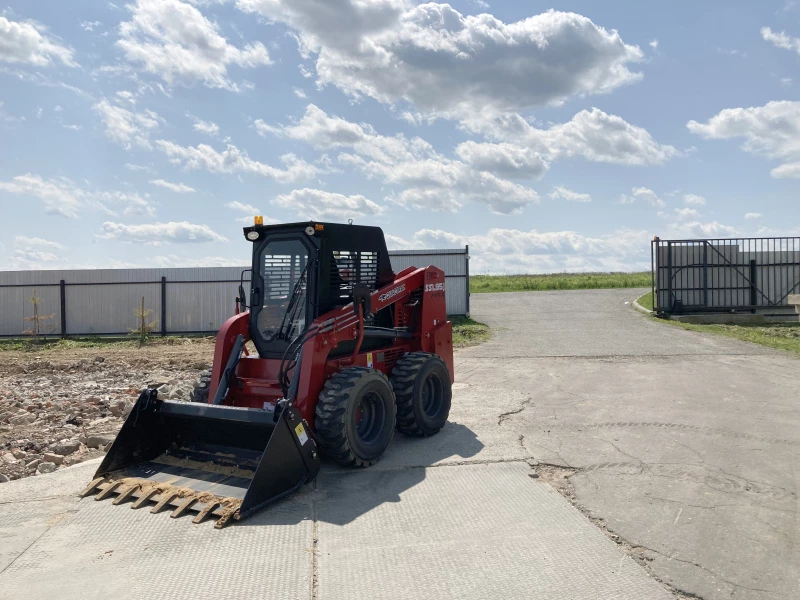 Мини-погрузчик QUADTRAC SSL95 MAX (950 кг кондиционер ковш 4-1)